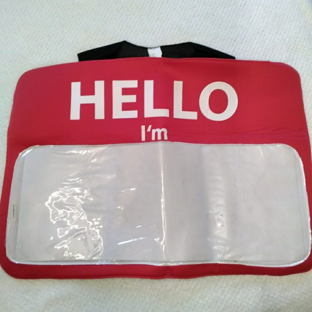 A huge HELLO name tag